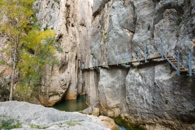 footbridge attached to the rock wall